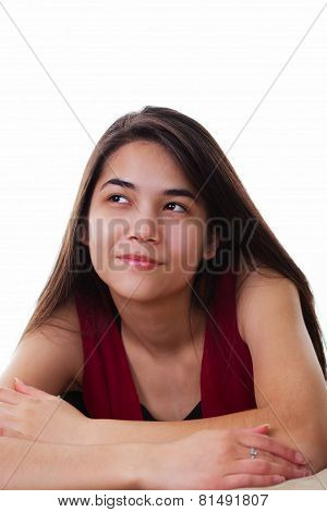 Beautiful Biracial Teen Girl Looing Up With Happy, Spunky Expression