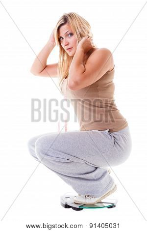 Woman Plus Size On Weight Scale