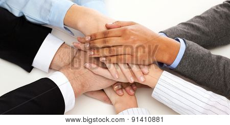 business, succcess and winning concept - group of businesspeople celebrating victory