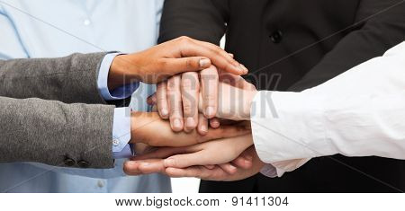 business, succcess and winning concept - group of businesspeople celebrating victory