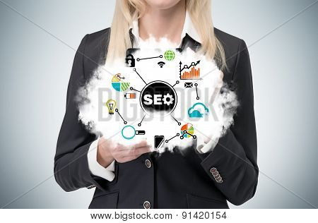 A Blonde Manager Is Holding A Cloud With 'seo' Optimisation Flowchart.