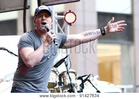 NEW YORK - MAY 22: Singer Jerrod Niemann performs at Fox and Friends' All-American Summer Concert Series on the corner of 48th Street and 6th Avenue on May 22, 2015 in New York City.