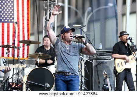 NEW YORK - MAY 22: Singer Jerrod Niemann performs at Fox and Friends' All-American Summer Concert Series on the corner of 48th Street and 6th Avenue on May 22, 2015 in New York City.