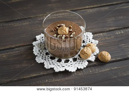 Chocolate Mousse With Nuts And Biscuits On A Dark Surface