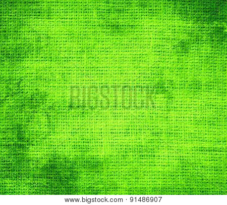 Grunge background of chartreuse (web) burlap texture