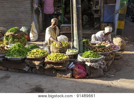 Man Selling Vegetables At Chawri Bazar In Delhi, India
