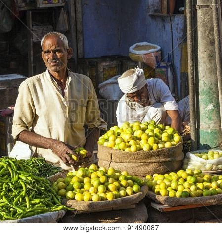 Man Selling Vegetables At Chawri Bazar In Delhi, India