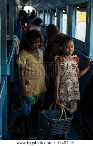 Little Girls Selling Snacks On Ferry Boat