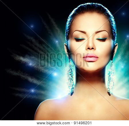 Fashion Glamour Model Woman portrait over black background. Earrings. Jewels. Trendy Makeup. Jewellery. Accessories. Perfect makeup