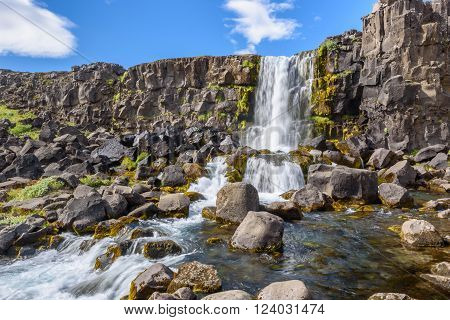 Beautiful Oxararfoss waterfall in summer Thingvellir National Park Iceland