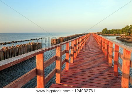 Wooden bridge and bamboo dam in sea