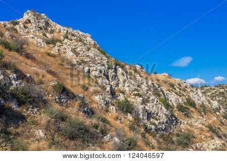 Khirokitia archaeological site on blue sky background, Cyprus