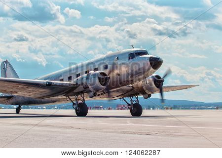 Dakota Douglas C 47 transport old plane boarded on the runway summer