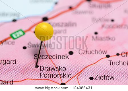 Photo of pinned Drawsko Pomorskie on a map of Poland. May be used as illustration for traveling theme.