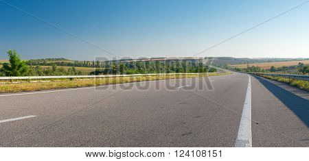 Morning landscape with high-way near Novomoskovsk city in central Ukraine