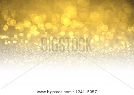 Gold glitter surface with gold light bokeh with white copyspace - It can be used for background for special occasions promotion campaign or product display