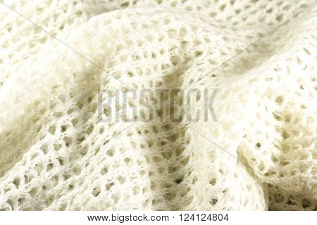 knitted woolen fabric close up as background