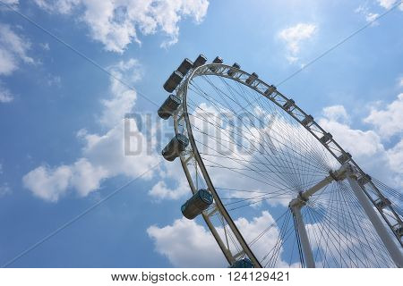 Singapore, Singapore - April 2, 2015: Ferris wheel Singapore Flyer at Marina Bay. The Flyer has an overall height of 165 metres and was opened in 2008.