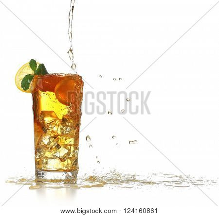 Fresh iced tea pouring in a glass
