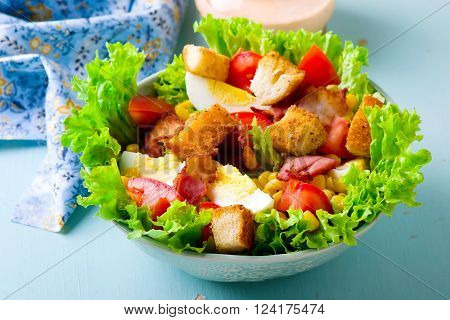 Cobb Salad with sauce . selective focus