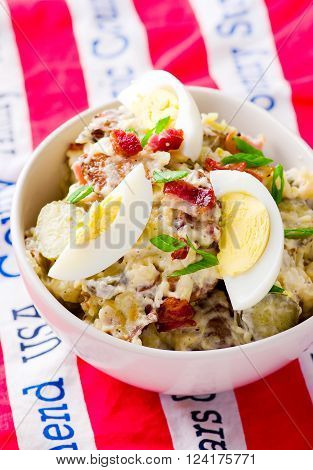 baked potato salad with egg and bakon .selective focus