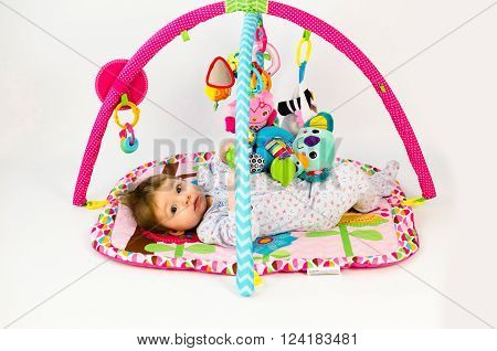 Baby Girl Palying In An Activity Gym