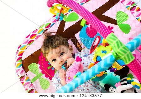 Baby Girl Palying In An Activity Gym