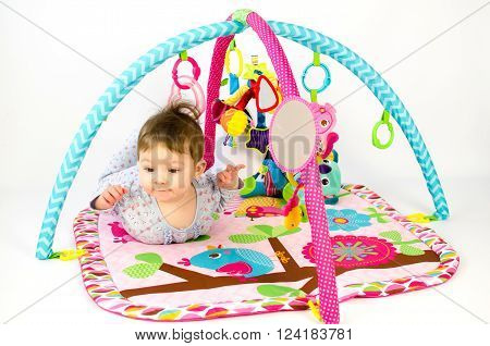 Baby Girl Palying In An Activity Gym