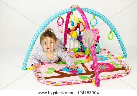Baby Girl Palying In An Activity Gym