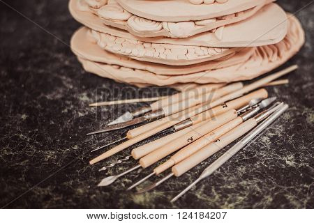 tools for pottery. Detail from pottery work room - brushes and tools