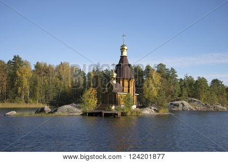 The Church of St. Andrew in the middle of the river Vuoksa autumn day. Priozersky district, Leningrad region, Russia