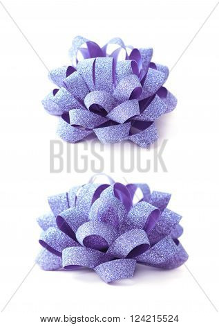 Decorational violet ribbon gift bow isolated over the white background, set collection of two diffirent foreshortenings