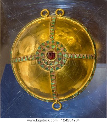 AZOV RUSSIA- SEPTEMBER 20- Details harness -Breast phalars .1 century AD. Gold almandine coral turquoise in the museum - reserve on September 20;2015 in Azov