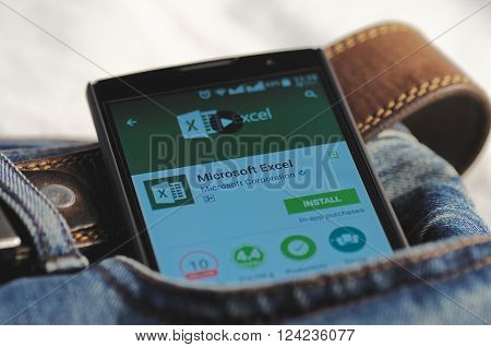 SARANSK, RUSSIA - April 3, 2016: Photo of Smartphone in a jeans pocket with Microsoft Excel application in a Google Play Store on the screen.
