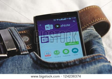 SARANSK, RUSSIA - April 3, 2016: Photo of Smartphone in a jeans pocket with Microsoft OneNote application in a Google Play Store on the screen.