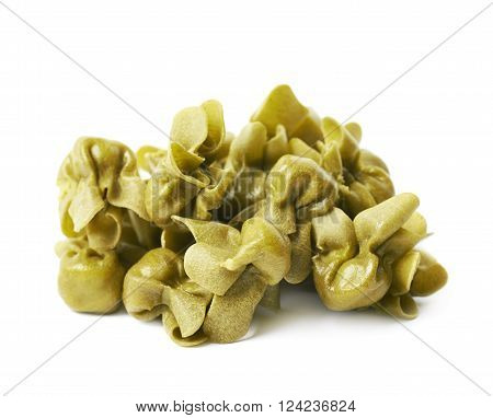 Pile of sacchettoni stuffed sacchetti pasta isolated over the white background