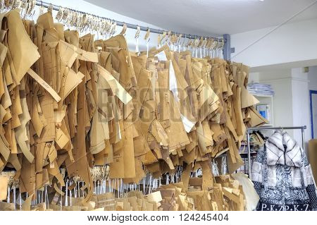 GREECE KASTORIA - March 12.2016: Workshop on sewing female fur coats on a factory. French curve