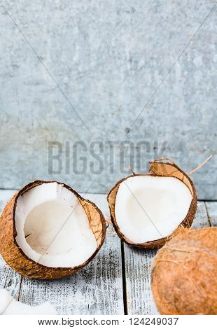 Fresh Coconuts In The Shell On A Blue  Wooden Background