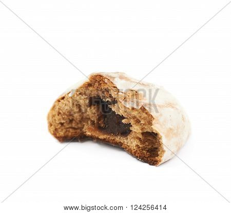 Single russian gingerbread cookie, bitten, composition isolated over the white background