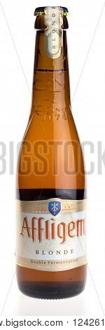GRONINGEN, NETHERLANDS - APRIL 3, 2016: Belgian beer Affligem Blonde isolated on white background