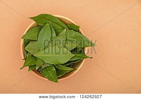 Bowl Of Bay Leaves On Kraft Paper
