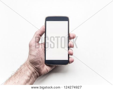 Man's hand holding and using mobile smartphone on white background