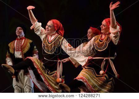 ST. PETERSBURG, RUSSIA - MARCH 28, 2016: Young dancers perform Bulgarian dance at the opening ceremony of X International Festival of Choreographic Art Pari Grand
