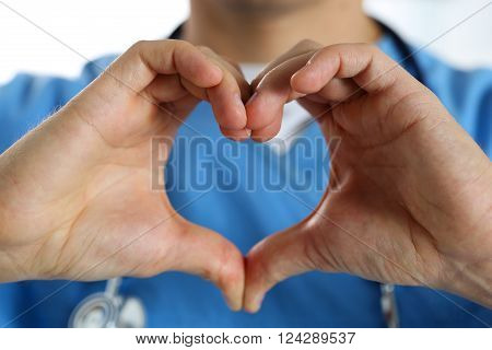 Hands Of Male Medicine Therapeutist Doctor Wearing Blue Uniform