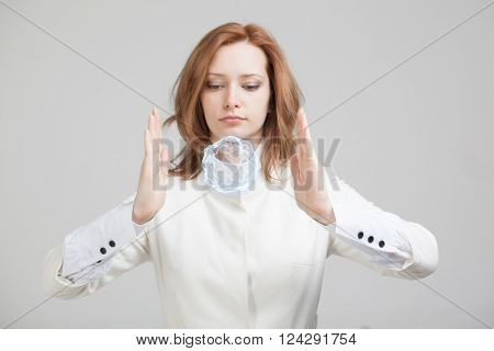 Woman with glowing magical energy ball.