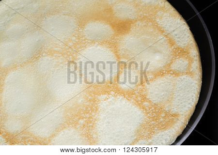 Frying pan with pancake baking on it
** Note: Soft Focus at 100%, best at smaller sizes