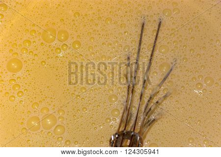 Pancake liquid ready to be baked with stainless steel metal eggs stirrer tool
** Note: Soft Focus at 100%, best at smaller sizes