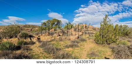 Thin line of a hiking trail through the wilderness of the Mojave desert in southwest United States.