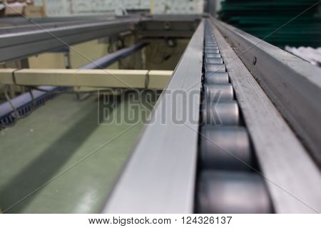 Conveyor line assembly in production, manufacturing steel,
** Note: Shallow depth of field