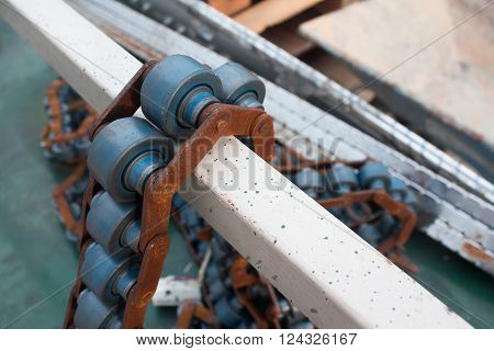 conveyor chain line assembly in technology line
** Note: Shallow depth of field